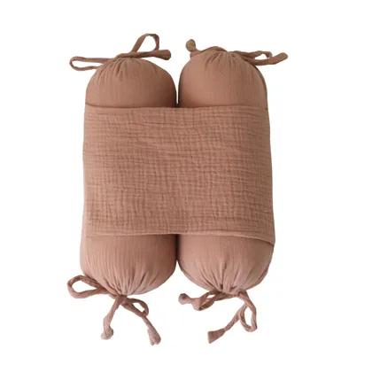 Gối chặn sơ sinh · Nâu
